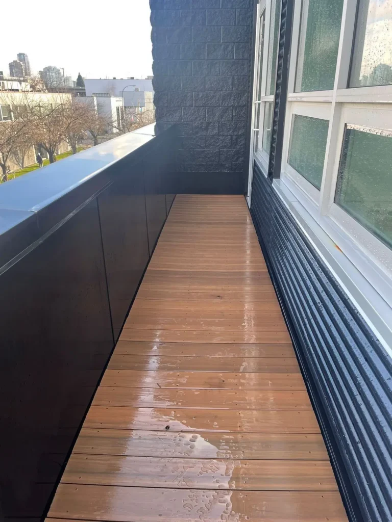 pressure washing office balcony after